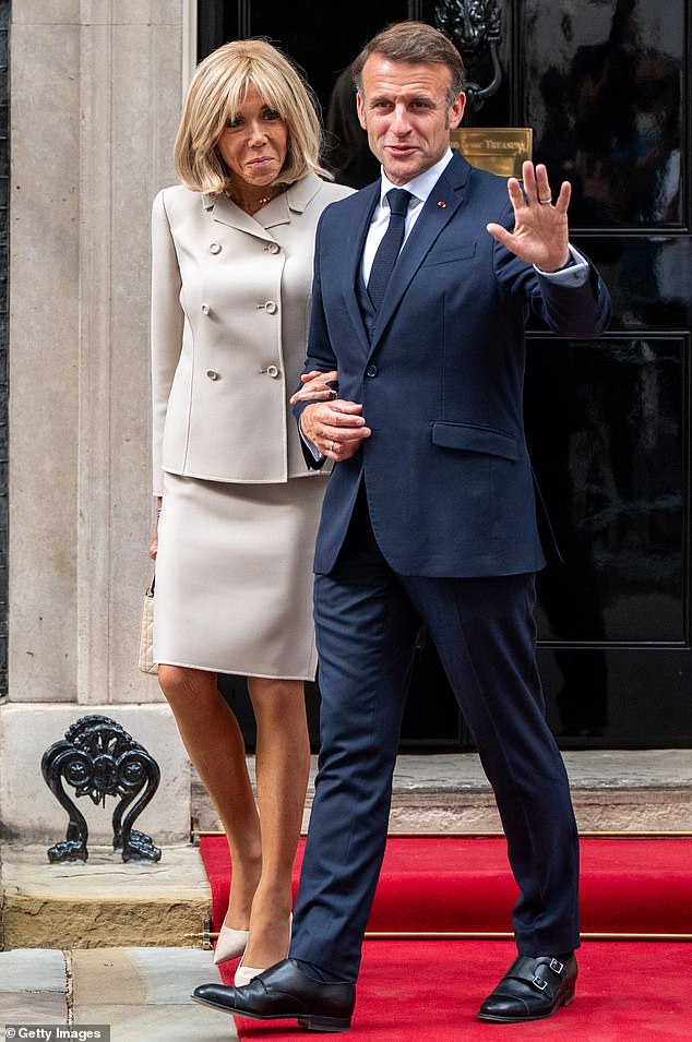 French President Emmanuel Macron and his wife Brigitte Macron depart Downing Street after meeting with Prime Minister Keir Starmer and his wife Victoria Starmer on July 9, 2025 in London
