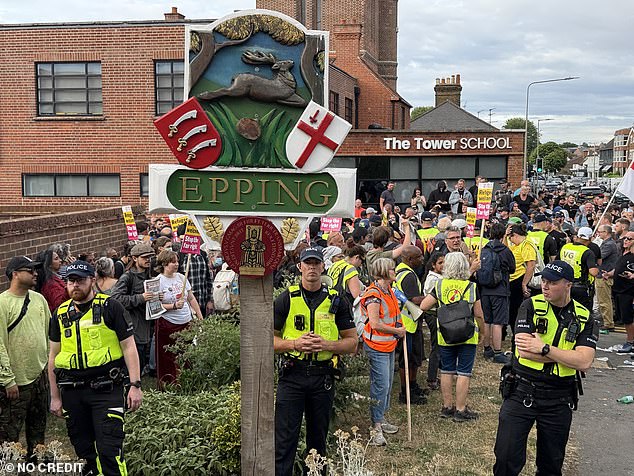 Essex Police were out in force in Epping on Thusday as hundreds of angry residents took to the streets to voice their anger after an asylum seeker was charged with sexual offences
