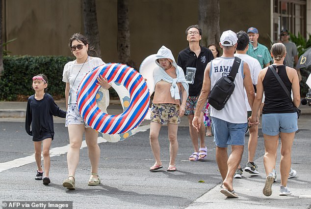 Hawaii residents were urged to evacuate from coastal areas as the entire island chain braced for the impact to strike at 1 am EST or 7pm local time