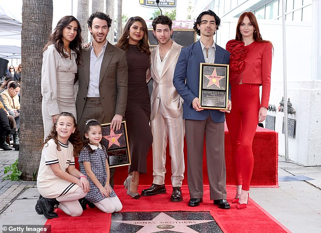 Jonas pictured with Turner and his brothers Nick and Kevin Jonas, alongside their wives Danielle Jonas and Priyanka Chopra