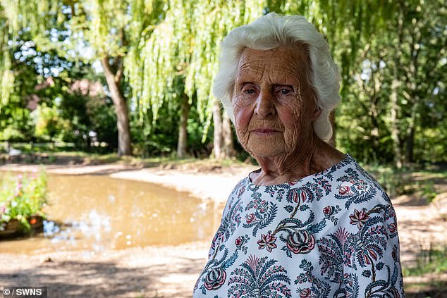 Retired field hand Betty North (pictured), 91, has lived three cottages away from the pond since 1956 and is one of a growing number of residents frustrated with the council's decision