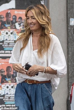 She recently returned from a Spanish getaway with a male pal and in snaps obtained exclusively by The Daily Mail, Cat was seen out at a restaurant in Sitges