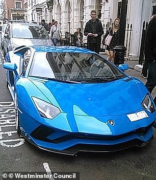 This sports car was parked illegally in a disabled bay without a blue badge