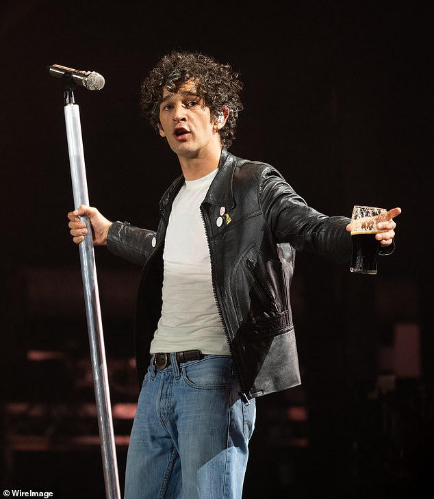 The singer, 32, has said she is 'disappointed' that the 1975 frontman, 36, has shared that he 'doesn't want to share his political view' with fans; Matty Healy pictured in June