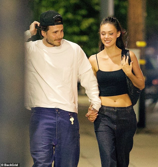 While Brooklyn opted for a white top layered over a long sleeve sweatshirt