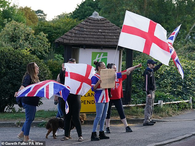 Protesters outside the Holiday Inn Central, Ashford, Kent, believed to be housing asylum seekers