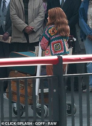 Actress Gracie was seen pushing a trolley with one of the young wizard's cases