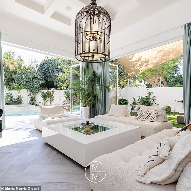 The property which was previously listed for 32.5million dirhams (£6,550,310.00) boasts a basement cinema as well as a rooftop terrace (Pictured: the open plan living room)