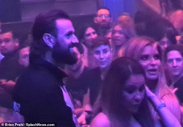 He smiled in Jessica's direction during Ashlee's high-energy set