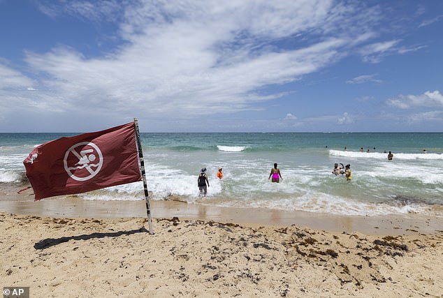 Swells from the hurricane are expected to cause 'life-threatening surf and rip currents' on the East Coast