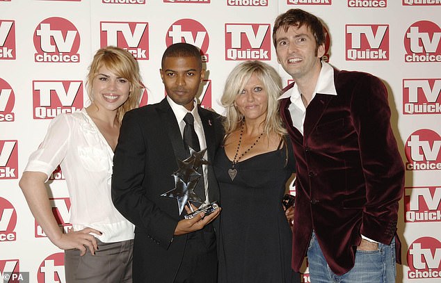 Clarke (second from left) collects the Best Loved Drama at the TV Quick and TV Choice Awards in London in 2006 alongside co-stars Billie Piper, Camille Coduri and David Tennant