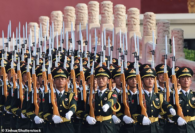 Before Xi spoke, the ceremony began with an 80-gun artillery salute to mark the 80 years since the end of the war, followed by the national anthem