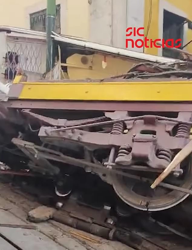 Teresa d'Avó told Portuguese TV channel SIC the train struck a building 'with brutal force and collapsed like a cardboard box'