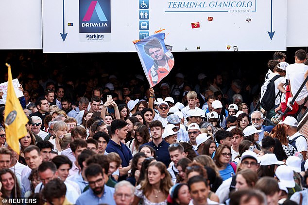 People gather on the day Pope Leo XIV leads a Holy Mass for the canonisation of Carlo Acutis, in Rome, Italy, September 7, 2025