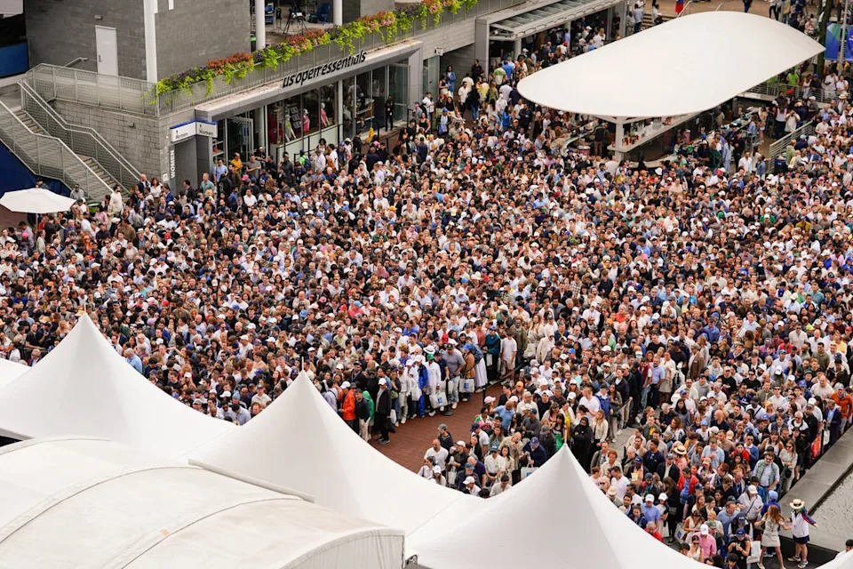 Tennis fans line up to get into Arthur Ashe Stadium to watch Jannik Sinner, of Italy, and Carlos Alcaraz, of Spain, play in the men's singles final of the U.S. Open tennis championships (AP)