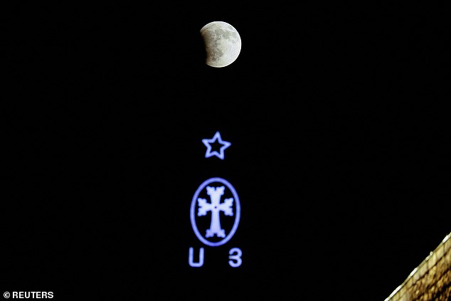 Pictured over the Church of the Nativity at night, during a total lunar eclipse