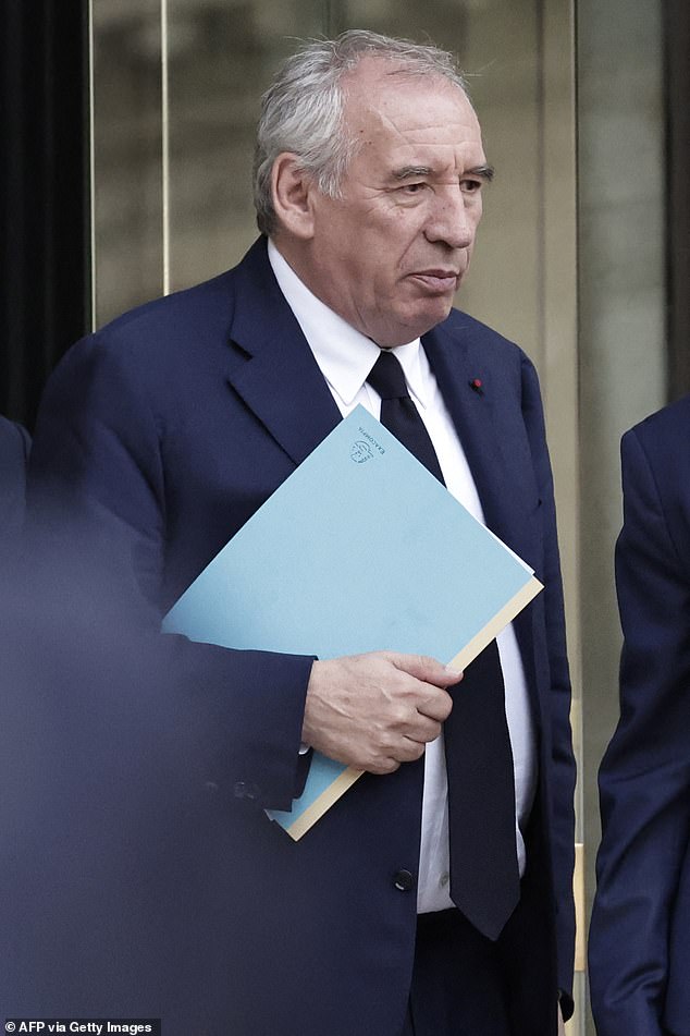 Francois Bayrou leaves the National Assembly after the humiliating result of a confidence vote