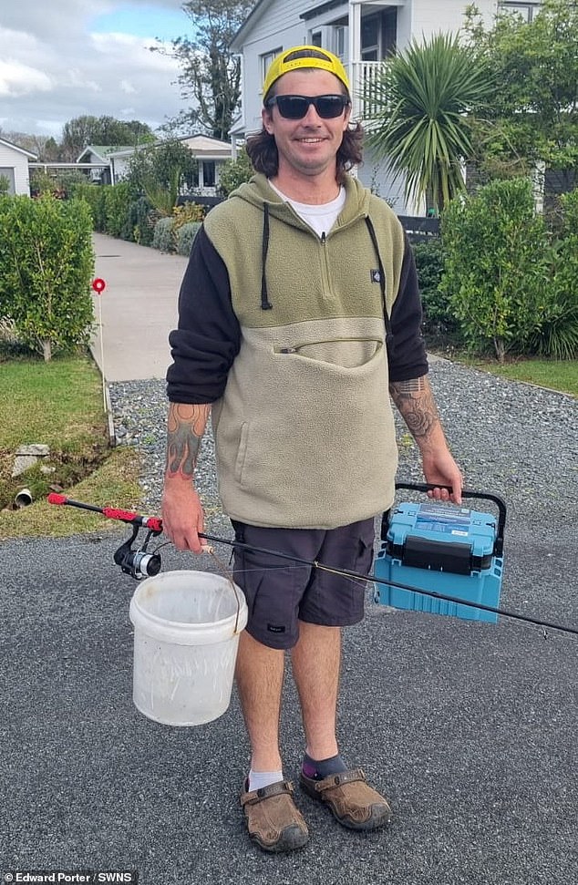 Ed, pictured on a fishing trip, said they had never visited Warkworth in North Island before moving there