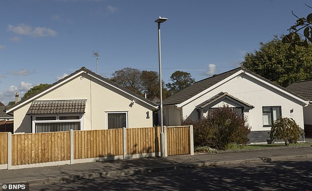 The bungalows overlook a green boasting mature trees in the quiet cul-de-sac