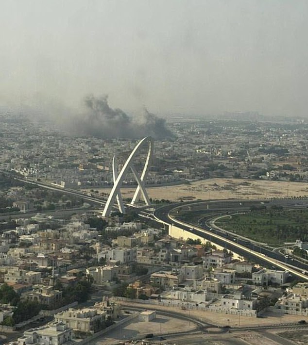 Smoke is seen rising after blasts were heard in Doha, Qatar, on Tuesday