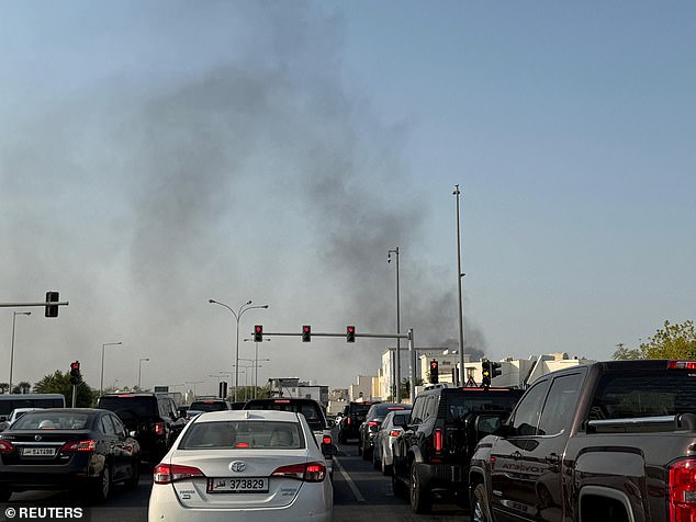 Smoke rises after several blasts were heard in Doha, Qatar, September 9
