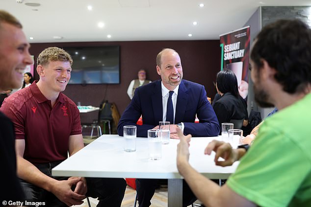 Prince William talks to members of the Welsh Rugby Union during his visit to Cardiff today