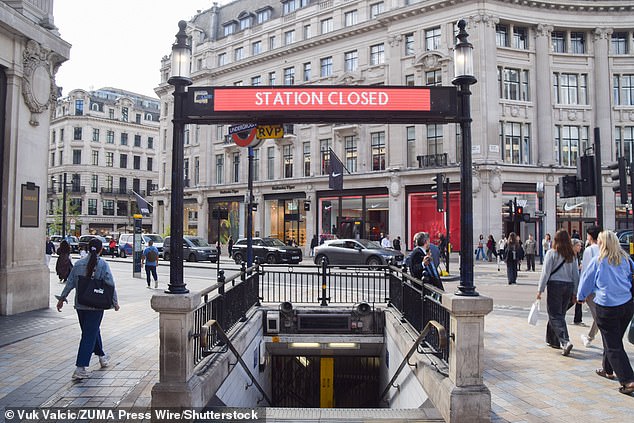 A 'station closed' sign outside Oxford Circus London Underground station this afternoon