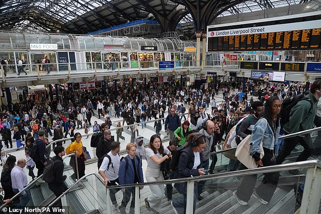 Passengers inside Liverpool Street station as the Underground strike continues yesterday