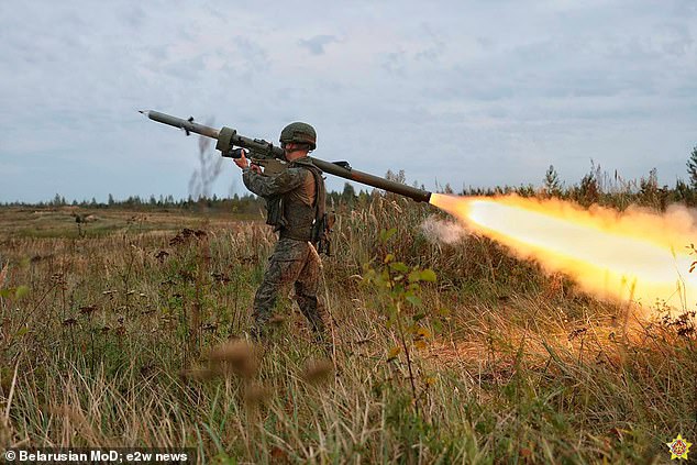 The Russian-Belarusian war games (pictured) also saw a dozen warships from Putin's Baltic Sea Fleet engaged in drills with Su-30SM and Su-24M aircraft, and Mi-8 helicopters, against a mock enemy
