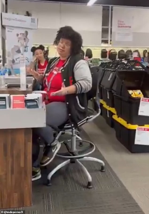 Republican activist Matthew DePerno shared a video from inside the store, where he questions an employee who identified herself as a manager (pictured) and insisted that the store does not print materials like that