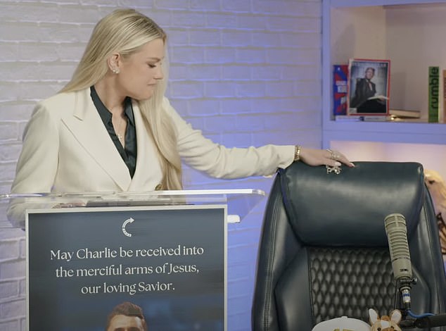 Erika reached out to touch the chair where her husband once sat to present his podcast