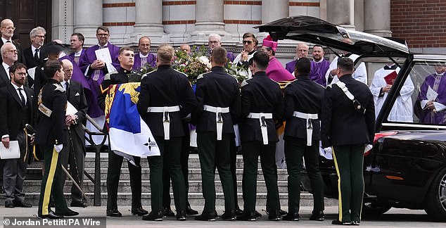 The Duke was emotional as he watched his wife's coffin be carried out after her Requiem Mass service