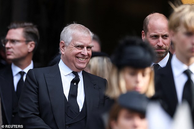 Prince Andrew smiles next to Prince William at the end of the requiem mass this afternoon