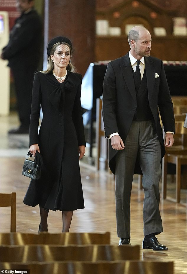 The Prince and Princess of Wales walk into Westminster Cathedral for the funeral today