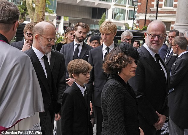 Lord Nicholas Windsor (2nd left) and the Earl and Countess of St Andrews (right) arrive today