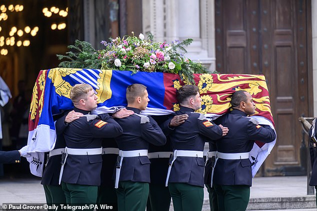 The bearer party carry the coffin of the Duchess of Kent into Westminster Cathedral yesterday
