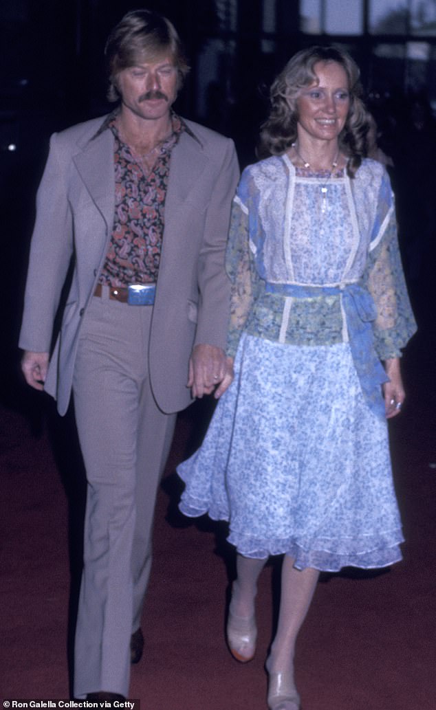 According to The Times of London , Redford proposed to her during a phone call, and they married in Las Vegas that next year