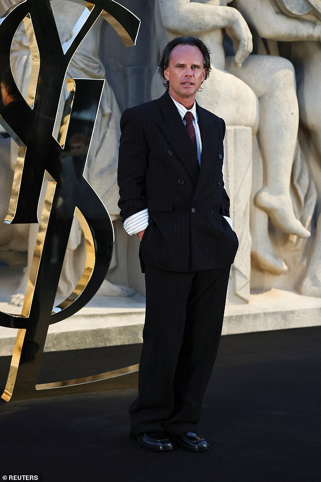 The White Lotus star Walton Goggins cut a dapper figure in a sharp black suit as he arrived for annual show