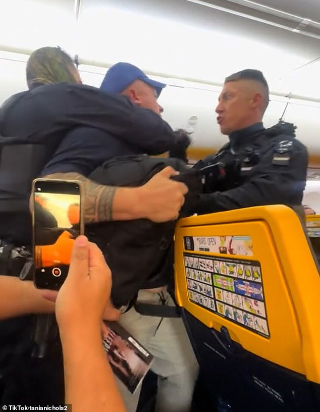 Passenger Tania Nichols said the group had been 'loud and unruly' and that 'even before take-off, they were moving around the cabin, swapping seats and ignoring basic safety protocols'