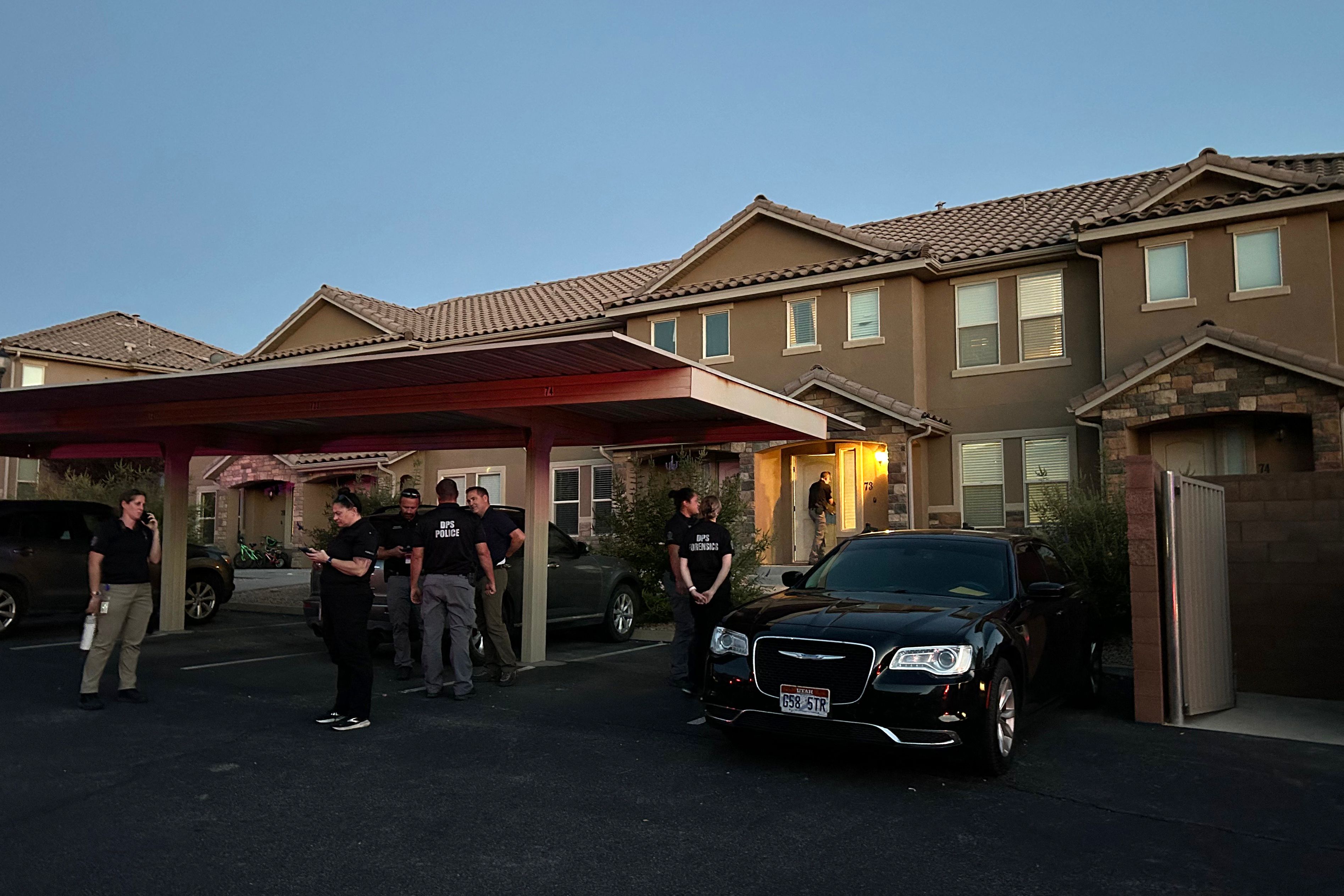 Forensic agents are seen at the apartment complex where Tyler Robinson, the 22-year-old suspected of killing right-wing activist Charlie Kirk, lives in St. George, Utah, on September 12, 2025.(AFP)