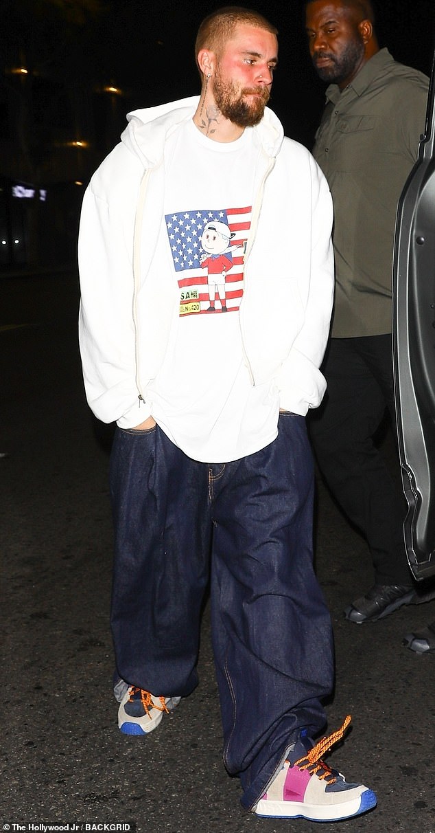 The music artist held a serious expression on his face as he left the spa and strolled over to an awaiting vehicle nearby to head to his next destination