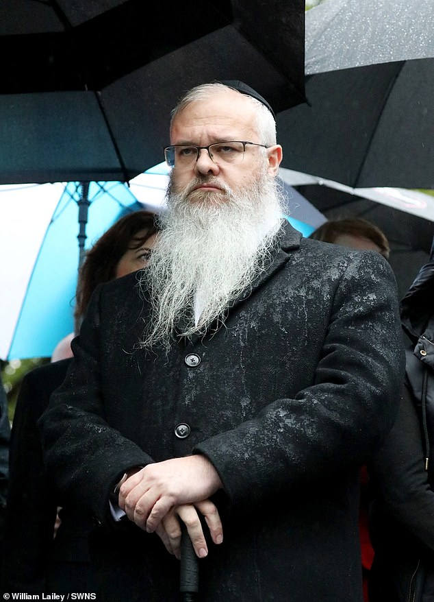 Rabbi Daniel Walker is seen at a vigil for the victims of yesterday's attack in Crumpsall, Manchester today