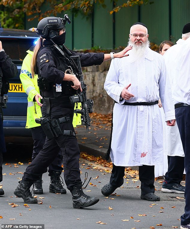 Rabbi Daniel Walker (pictured right) leapt into action after the Heaton Park Hebrew Congregation Synagogue came under attack this morning
