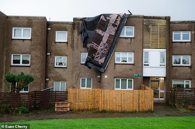 Strong winds blew the roof off a block of flats in Cumbernauld, in North Lanarkshire, Scotland