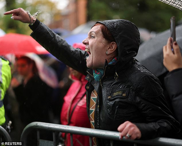 A woman shouts during a vigil organised by the Jewish Representative Council of Greater Manchester