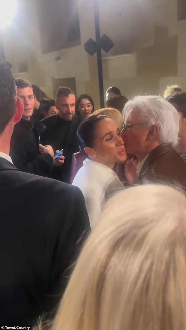 Baz and Meghan share a kiss on the cheek before Anna compliments Meghan's 'amazing' outfit