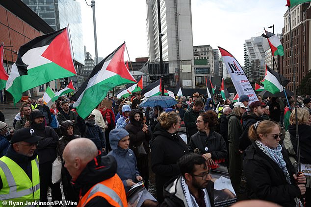 Pro-Palestine demonstrators gather at a rally in Manchester on Saturday