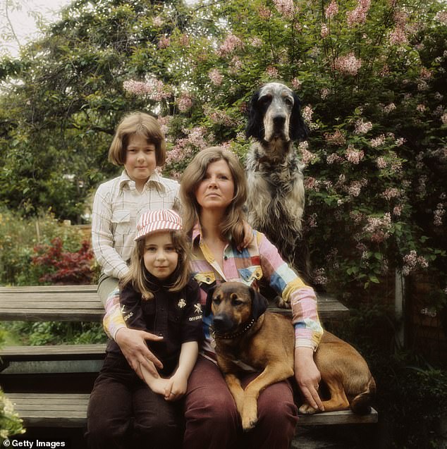 Jilly Cooper with her adopted children Felix and Emily and their dogs, circa 1978