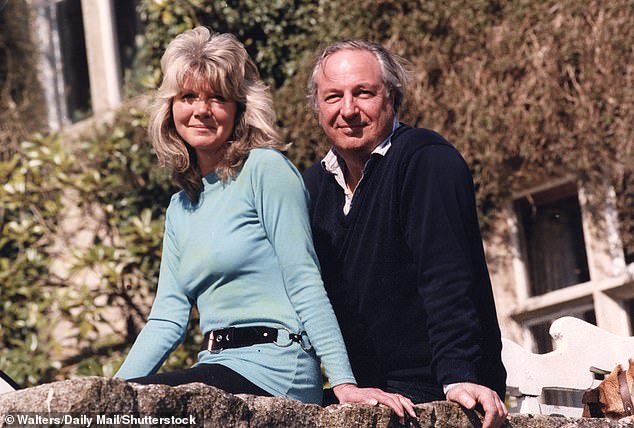 Dame Jilly with her husband Leo outside their home, 1991