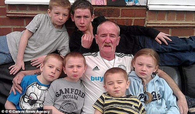 Mick Philpott is pictured with his six children, who all tragically died in the blaze in May 2012